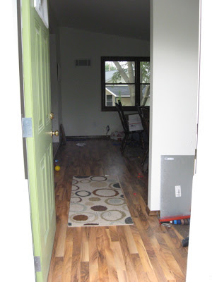 open door leading into entryway of house